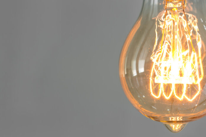 Close up of vintage glowing light bulb