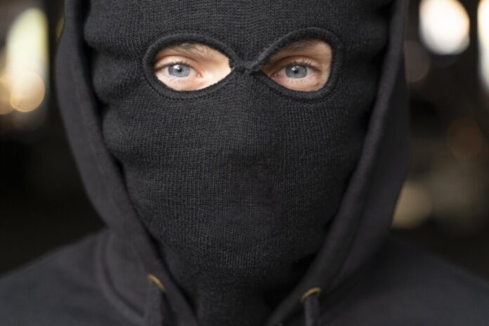 close-up-man-trying-break-into-car