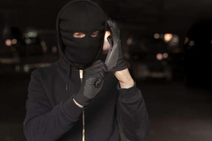 close-up-man-trying-break-into-car (1)
